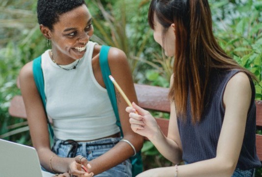 Two women talking